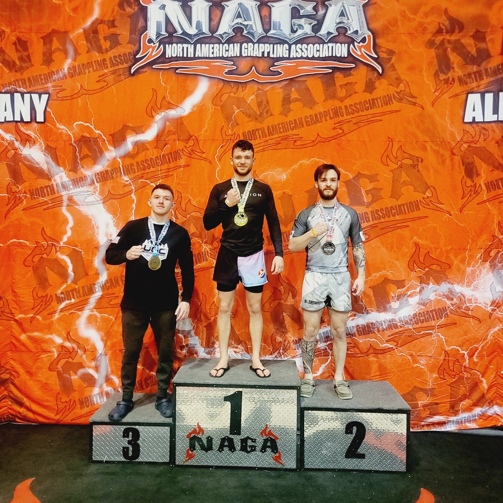Chris on the podium at a NAGA grappling tournament