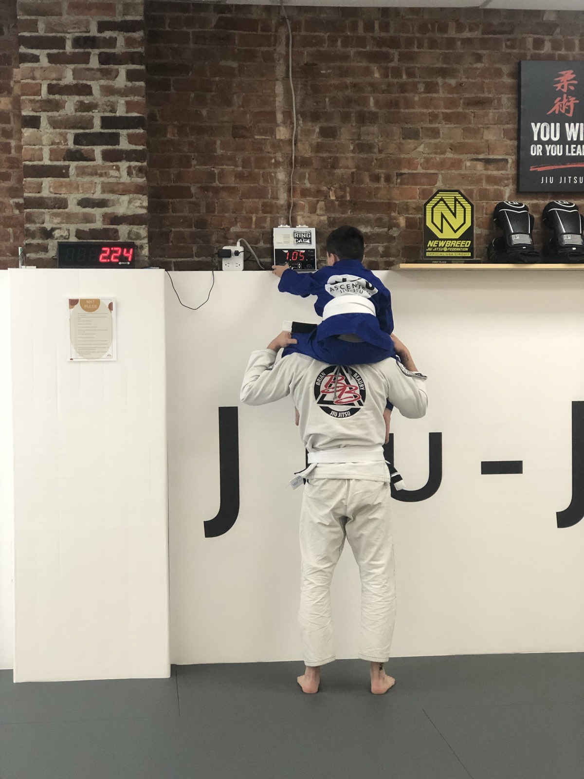 Chris training with a young Brazilian Jiu-Jitsu student