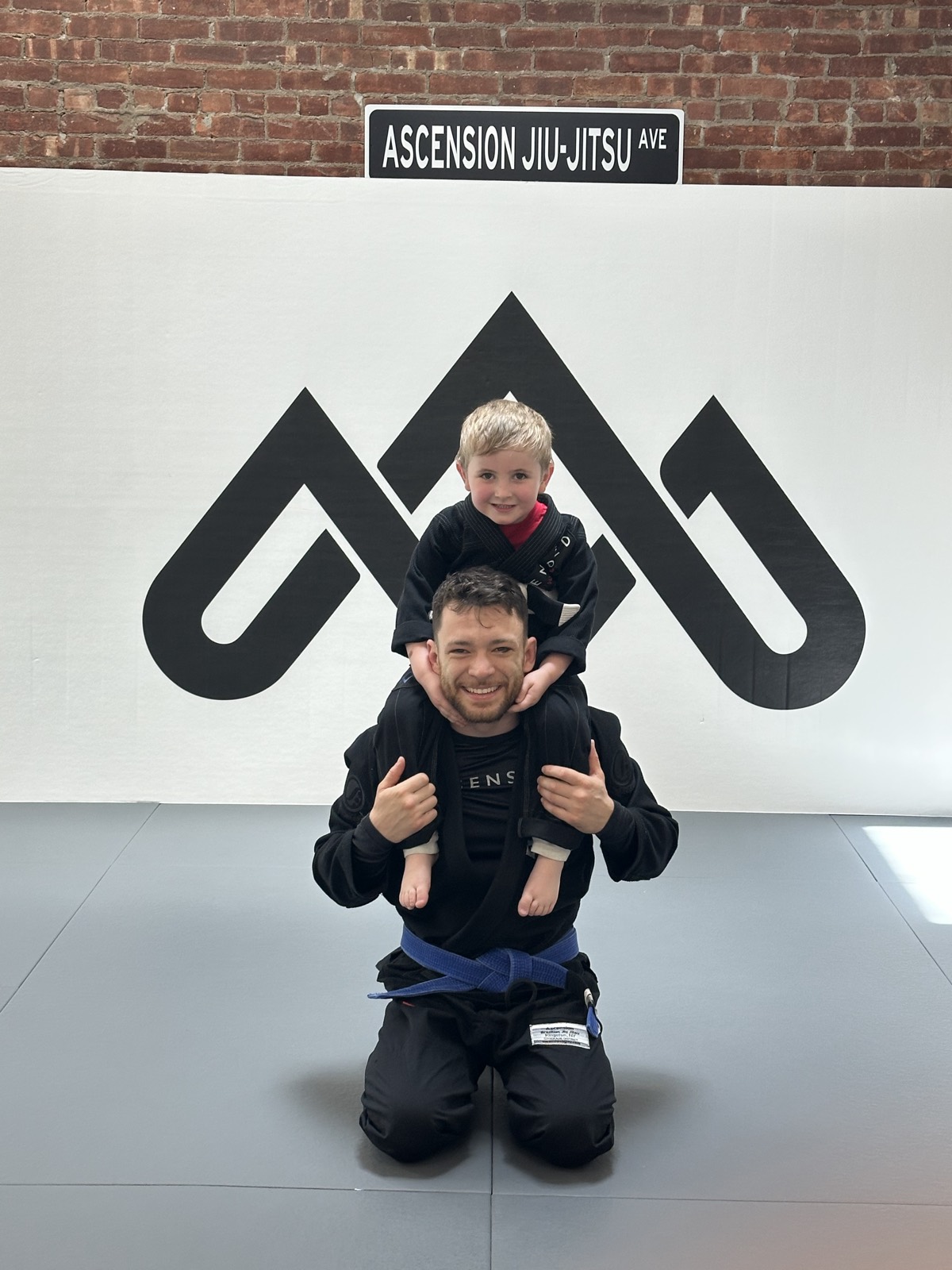 Chris with a young student at Ascension Jiu-Jitsu